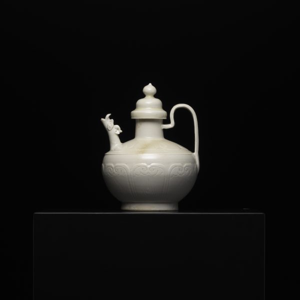 A White-glazed DING “Dragon” Ewer with Bas-relief of Lotus Petals