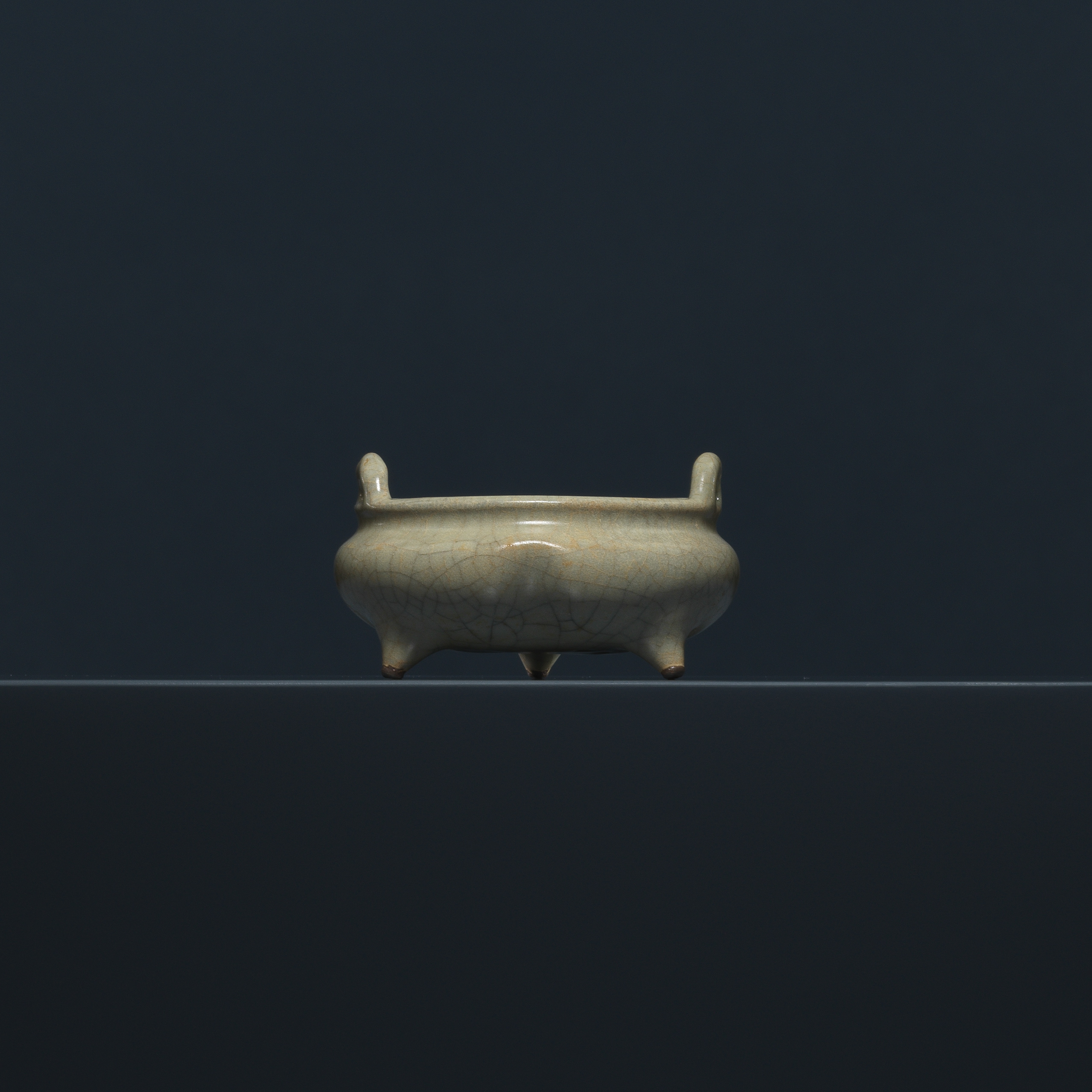 A Celadon-glazed GE Tripod Incense Burner