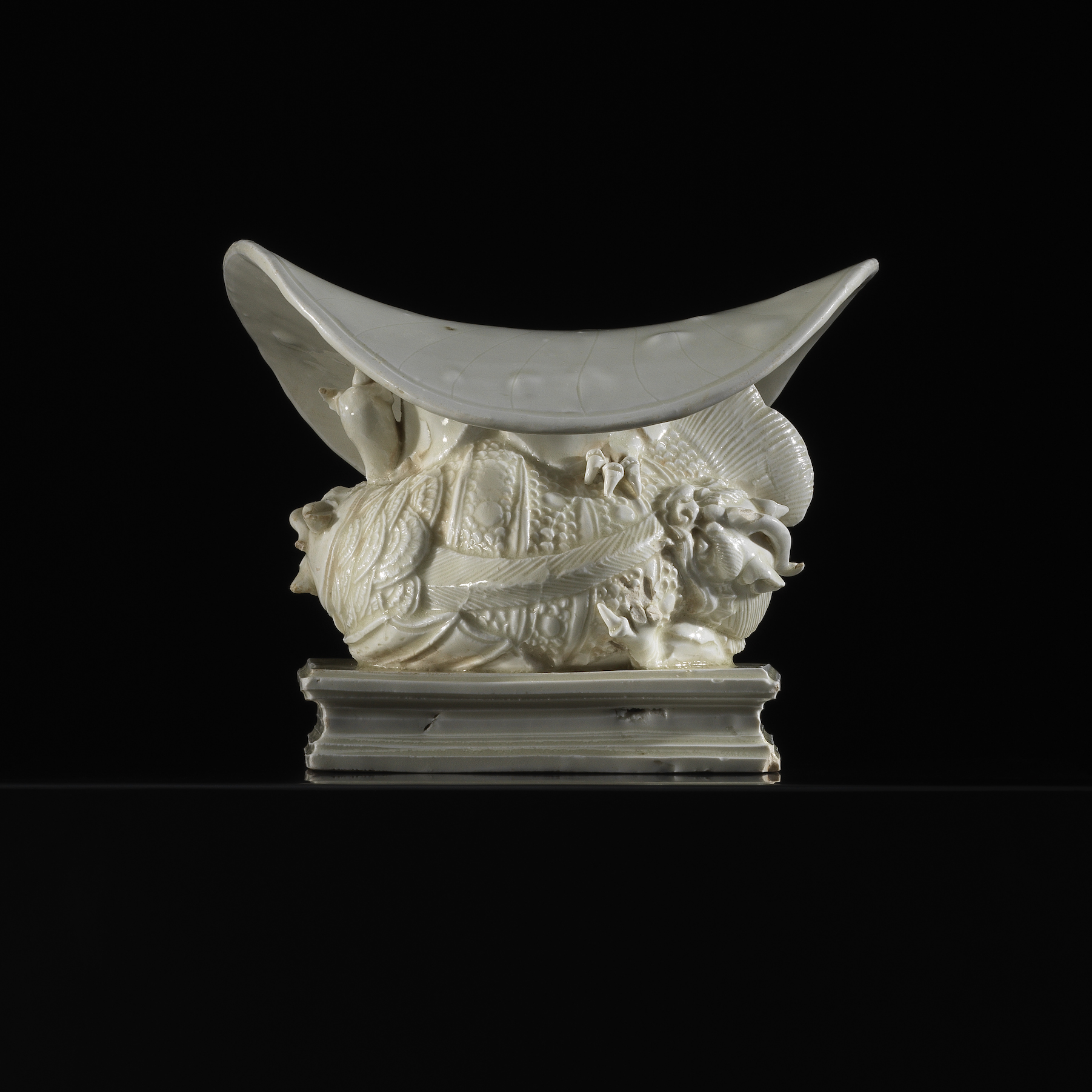 A White-glazed DING “Makara” Pillow