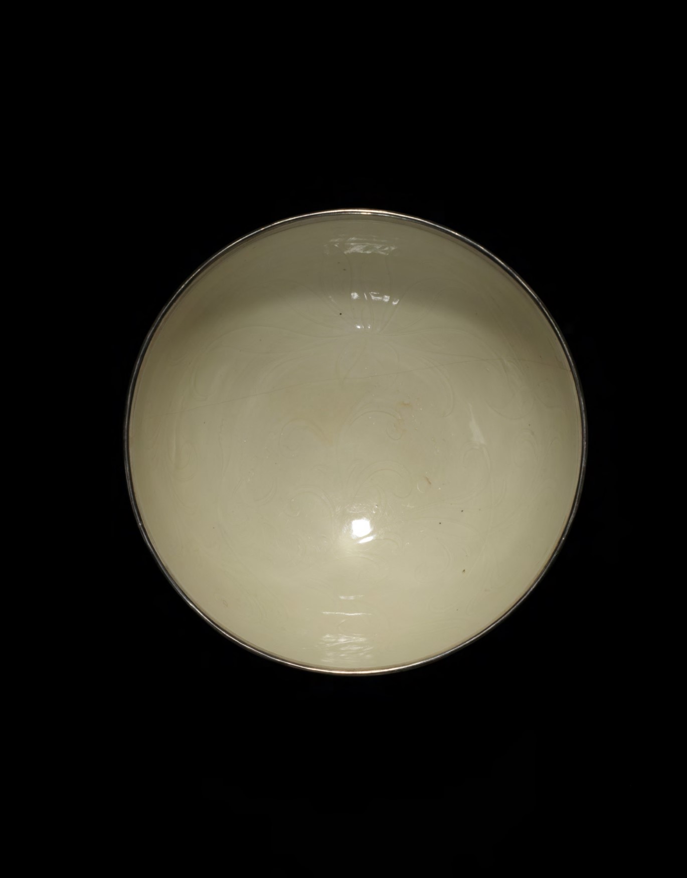 A White-glazed DING Alms Bowl with Incised Flowers